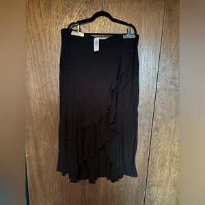 Torrid tea length/maxi length flowy black skirt. Size 2x.